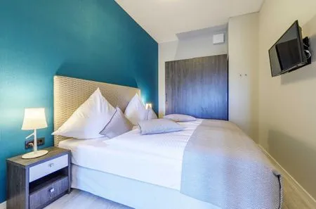 Ferienwohnung Columbus Suite Ostseebad Wustrow ZweiWasser Alte Seefahrtschule Schlafzimmer  Columbus Suite