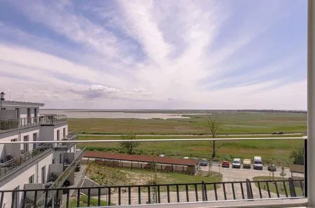 Ferienwohnung Seebadquartier Ostseebad Wustrow Balkon mit Ausblick auf Boddenlandschaft  Seebadquartier