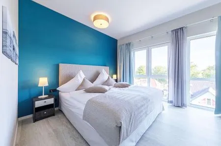 Ferienwohnung Rundblick Ostseebad Wustrow ZweiWasser Alte Seefahrtschule Schlafzimmer  Rundblick