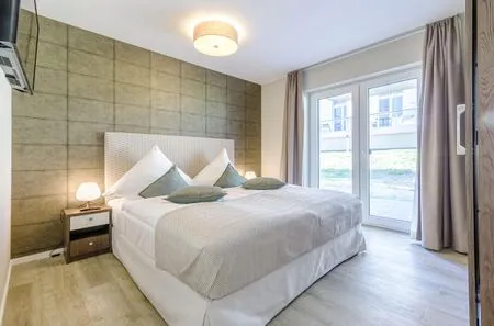 Ferienwohnung Großer Strandkorb Ostseebad Wustrow ZweiWasser Alte Seefahrtschule Schlafzimmer  Großer Strandkorb