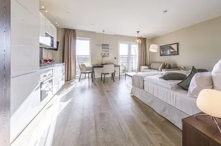 Ferienwohnung Kleiner Strandkorb Ostseebad Wustrow ZweiWasser Alte Seefahrtschule Lichtdurchfluteter Wohnbereich  Kleiner Strandkorb