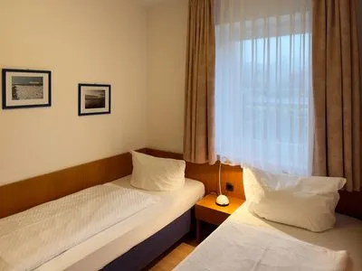 Schlafzimmer der Ferienwohnung Südspitze 18/3 in Wittdün auf Amrum Haus *Südspitze 18* Ferienwohnung "Südspitze 18/3"