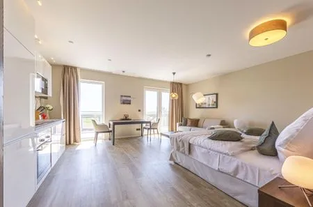 Ferienwohnung Kleine Strandoase Ostseebad Wustrow ZweiWasser Alte Seefahrtschule Heller Wohnbereich  Kleine Strandoase