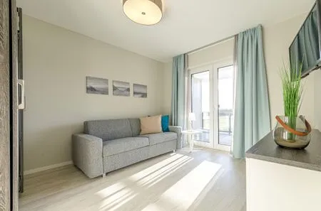 Ferienwohnung Strandblick Ostseebad Wustrow ZweiWasser Alte Seefahrtschule Gemütliches Sofa  Strandblick