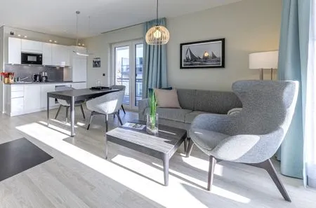 Ferienwohnung Stranddomizil Ostseebad Wustrow ZweiWasser Alte Seefahrtschule Heller Wohnbereich  Stranddomizil