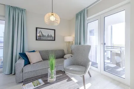 Ferienwohnung Stranddomizil Ostseebad Wustrow ZweiWasser Alte Seefahrtschule Gemütliches Wohnzimmer  Stranddomizil