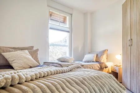 Schlafzimmer mit zwei Einzelbetten Hafenstrasse 15 in Prerow Ephelia in Prerow