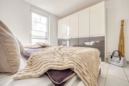 Schlafzimmer mit Doppelbett Hafenstrasse 15 in Prerow Ephelia in Prerow