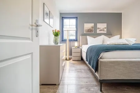 Schlafzimmer mit Doppelbett  Birkmaase 10 - Wohnung 1