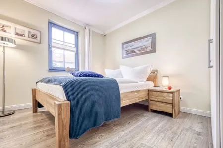 Schlafzimmer mit Doppelbett  Birkmaase 10 - Wohnung 1