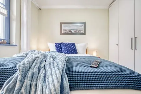 Schlafzimmer mit Doppelbett  Birkmaase 10 - Wohnung 1