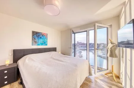 Ferienwohnung Wohlfühloase Hafenresidenz Waren (Müritz) - Schlafzimmer mit Hafenblick  Wohlfühloase