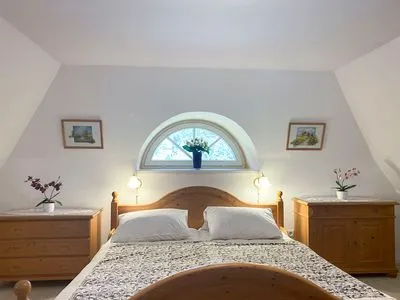 Schlafzimmer mit Doppelbett Achtern Diek Achtern Diek 7b - Wohnung 8