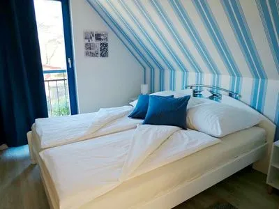 Schlafzimmer mit Doppelbett  Meeresrauschen 1