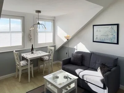 Wohnzimmer Haus *Südspitze 34* Ferienwohnung „Südspitze 34/25 - Schlieter"