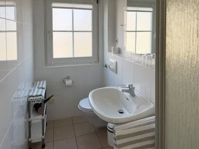 Badezimmer Haus *Südspitze 34* Ferienwohnung„Südspitze 34/27 - Schlieter"