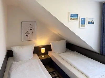 Schlafzimmer Haus *Südspitze 34* Ferienwohnung„Südspitze 34/27 - Schlieter"