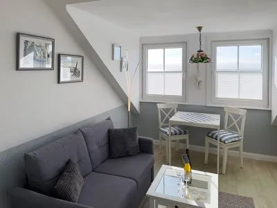 Wohnzimmer Haus *Südspitze 34* Ferienwohnung„Südspitze 34/27 - Schlieter"