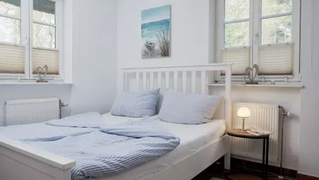 Schlafzimmer mit Doppelbett & Etagenbett Achtern Diek Achtern Diek 12b - Wohnung 1