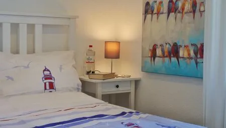 Schlafzimmer mit Doppelbett  Kapitänsgarten Wohnung 25