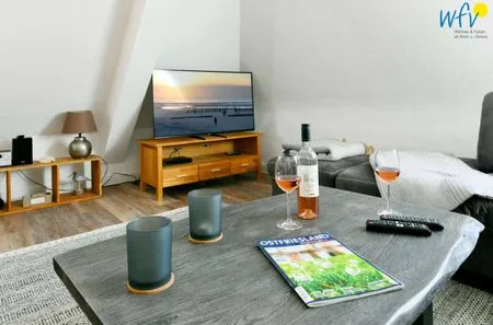 Wohnzimmer Haus Dünenrose Ferienwohnung Strandläufer
