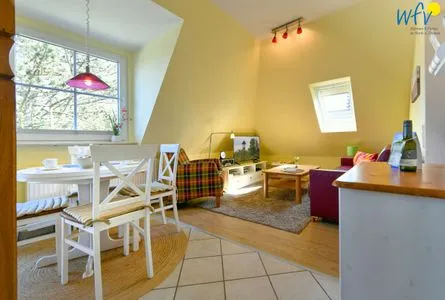 Wohnzimmer Haus Dünenrose Ferienwohnung Inselnest