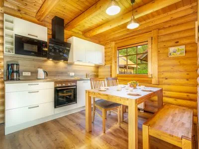 Küche / Küchenzeile Blockhaus James Cook - Meerblick