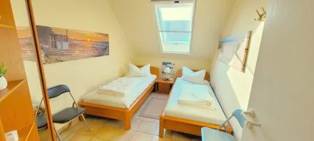 Schlafzimmer mit Einzelbetten Residenz am Strand Wohnung 2-39