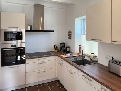 Küche / Küchenzeile Haus Dünenperle Ferienwohnung "Dünengras"