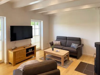 Wohnzimmer Haus Dünenperle Ferienwohnung "Wanderdüne"