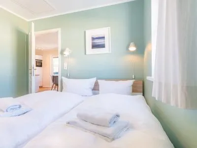 Schlafzimmer Ferienwohnung Strand 8