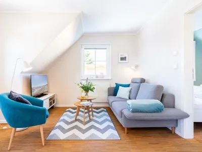 Wohnzimmer Ferienwohnung Strand 8
