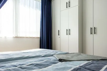 Schlafzimmer mit Doppelbett Residenz am Strand Wohnung 6-80