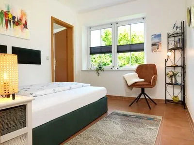 Schlafzimmer FIP Park Teichblick