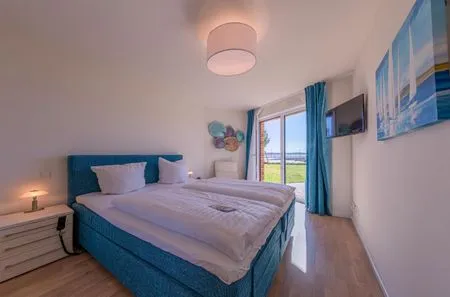 Ferienwohnung Libelle Hafenresidenz Waren (Müritz) - Schlafzimmer mit Ausblick  Libelle