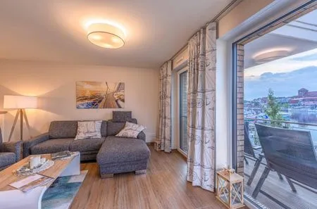 Ferienwohnung Müritz Charme Hafenresidenz Waren (Müritz) - Wohnzimmer mit Balkonzugang  Müritz Charme