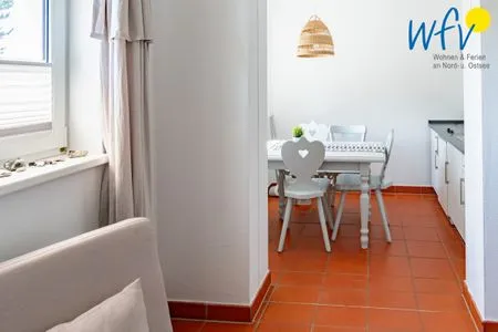 Wohnzimmer Ferienhaus am Gutspark Dranske Ferienwohnung Strandflieder