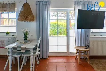 Wohnzimmer Ferienhaus am Gutspark Dranske Ferienwohnung Sonnengarten