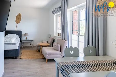 Schlafzimmer Ferienhaus am Gutspark Dranske Ferienwohnung Sonnenaufgang