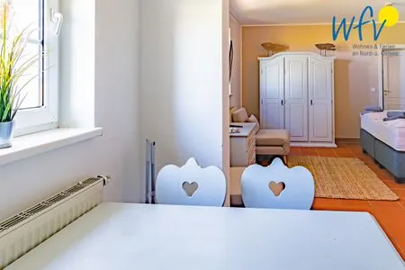 Wohnzimmer Ferienhaus am Gutspark Dranske Ferienwohnung Sonnenkuss