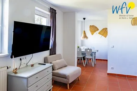 Schlafzimmer Ferienhaus am Gutspark Dranske Ferienwohnung Sonnenhut