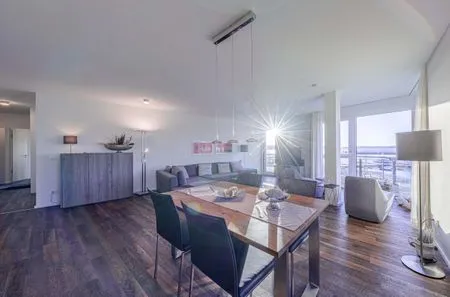 Ferienwohnung Quartier Lounge Hafenresidenz Waren (Müritz) -  Wohnzimmer mit Seeblick  Quartier Lounge