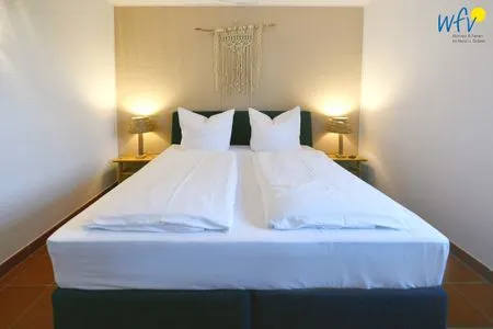 Schlafzimmer Ferienhaus am Gutspark Dranske Ferienwohnung Silbergras