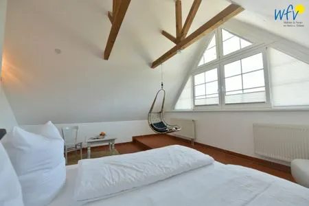 Schlafzimmer Ferienhaus am Gutspark Dranske Ferienwohnung Seegras