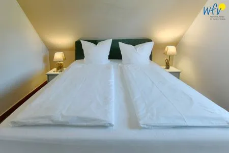 Schlafzimmer Ferienhaus am Gutspark Dranske Ferienwohnung Sonnenmorgen