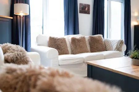 Wohnzimmer Ferienhaus "Sunseeker House No. 2"