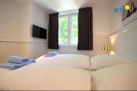 Schlafzimmer Haus Oldenburg Ferienwohnung 9