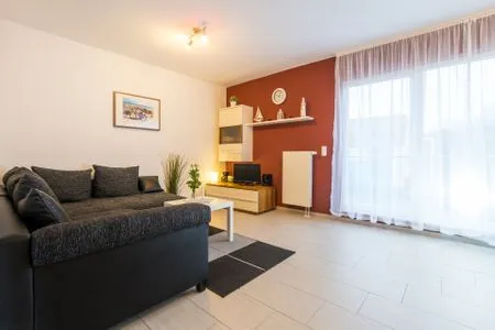 Wohnzimmer Kurpark Carré 28 Dünenrose