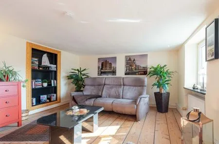 Ferienhaus InselGlück in Malchow Couch im Wohnzimmer  InselGlück