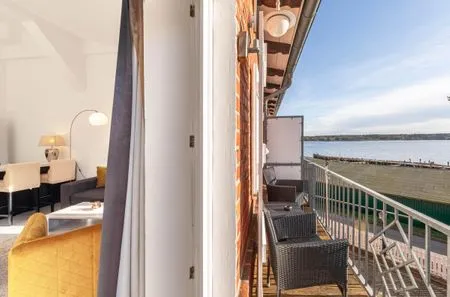 Ferienwohnung Kietz-Oase Waren (Müritz) - Balkon mit Blick auf den See  Kietz-Oase